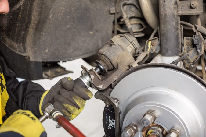 Car maintenance servicing brakes