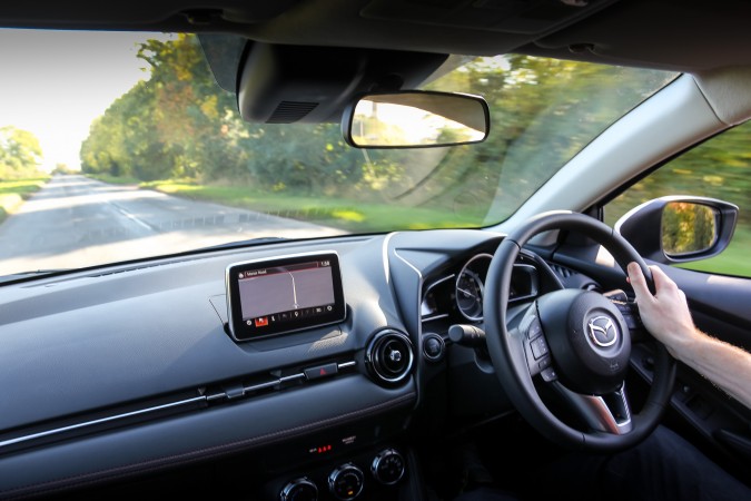 Mazda2 Sport Nav white driving steering wheel interior