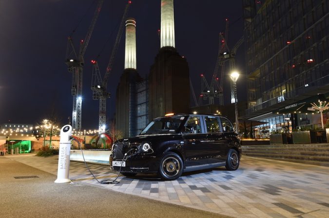 LEVC TX charging at Circus West Village from front. Battersea Power Station