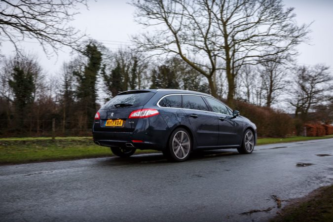 Peugeot 508 SW GT Blue Driving Away