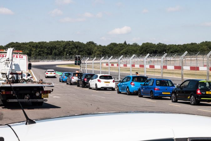 Open Pit lane, cars queuing as session is about to begin