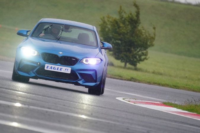 Paul Hadley Driving a BWM M2 on track in the wet at Bedford Autodrome