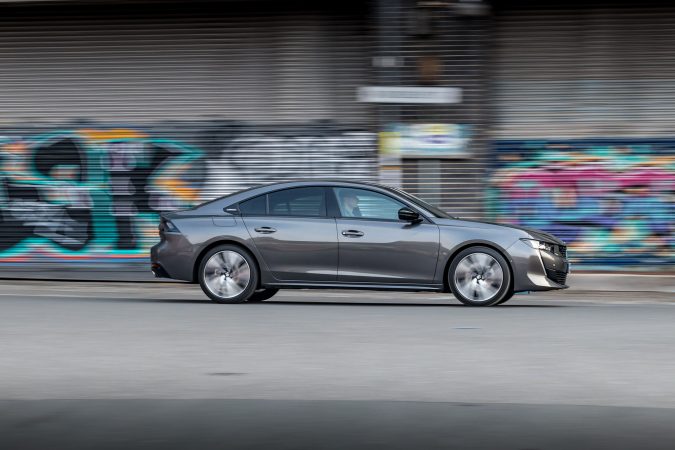 Peugeot 508 GT Line driving past 2019