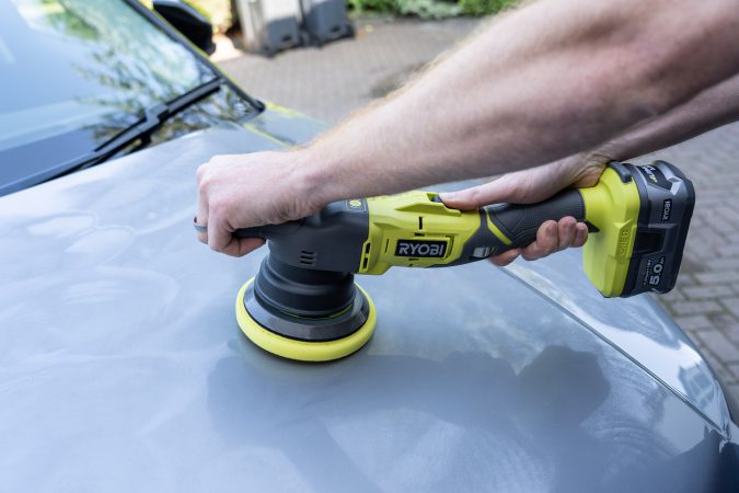 Ryobi One+ Dual Action Polisher testing on bonnet panel