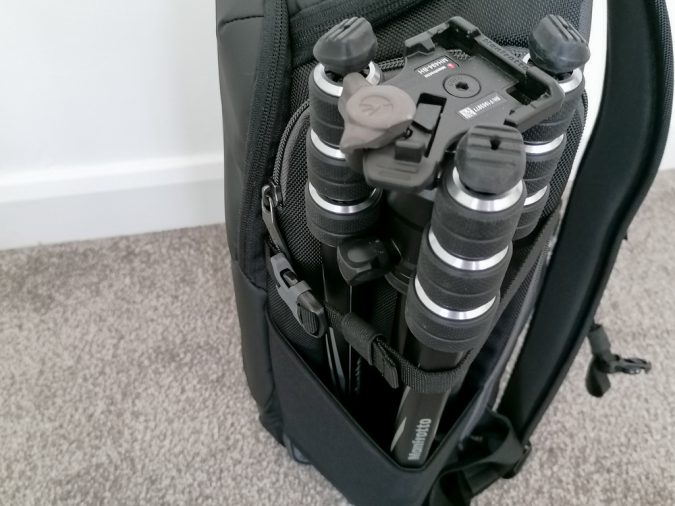 You could put tripods along the side pockets.