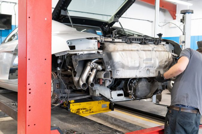Fixing or replacing a catalytic converter.