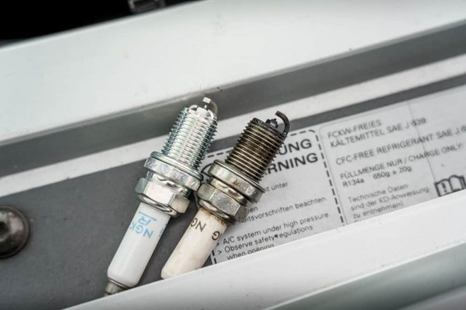 Gasoline engines use spark plugs for ignition, while diesel engines rely on compression and glow plugs
