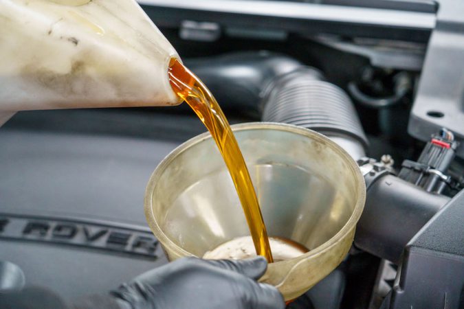 Car Maintenance Motor Engine Oil Fluid Change SUV Crossover