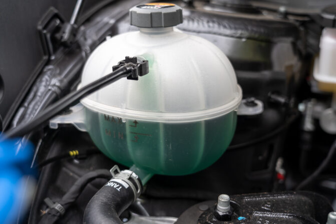 Can You Put Water In Coolant Tank