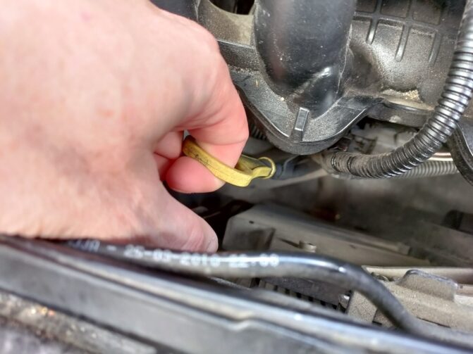 where should oil be on dipstick