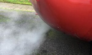 water coming out of exhaust while idling