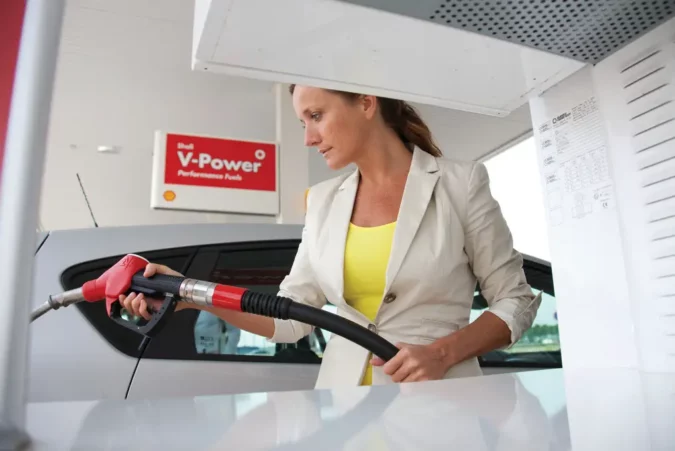 can you pump gas with the car on